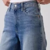 Jeans med hög midja, vid ben och ankellängd