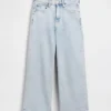 Jeans med hög midja, vid ben och ankellängd