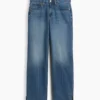 Jeans med medelhög midja, delad fåll och avslappnad rak passform