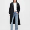 Jeans med medelhög midja, styv passform och avslappnad utsvängd benform