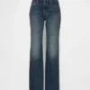 Jeans med medelhög midja, styv passform och avslappnad utsvängd benform