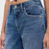 Jeans med medelhög midja, styv passform och rakt ben