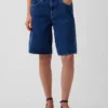 Jeansshorts med medelhög midja och lång passform