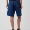 Jeansshorts med medelhög midja och lång passform