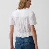 Kort peplum-top i bomullsgasväv