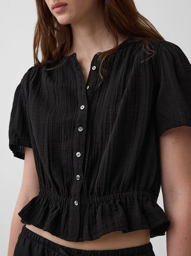 Kort peplum-top i bomullsgasväv
