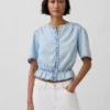 Kort peplum-top i denim