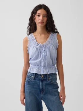Kort peplum-top med hålkant och knytning fram