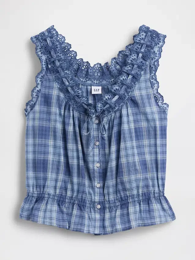 Kort peplum-top med hålkant och knytning fram
