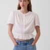 Kort peplum-top med knappar fram