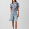 Kort peplum-top med knappar fram