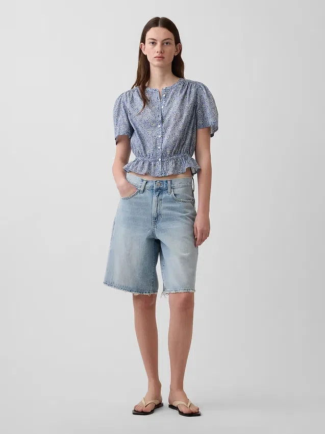 Kort peplum-top med knappar fram