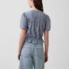 Kort peplum-top med knappar fram