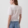 Kort peplum-top med knappar fram