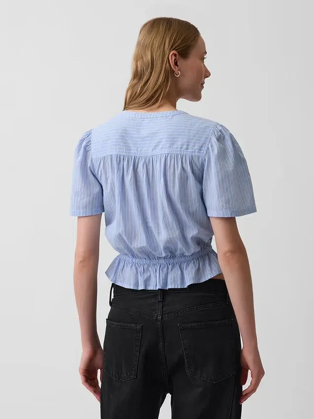 Kort peplum-top med knappar fram