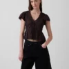 Kort topp med peplum i spetsvoile