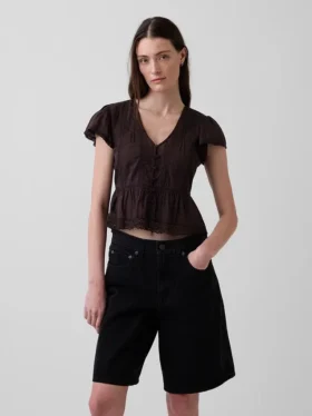 Kort topp med peplum i spetsvoile
