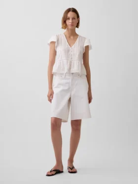 Kort topp med peplum i spetsvoile