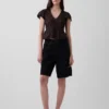 Kort topp med peplum i spetsvoile