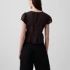 Kort topp med peplum i spetsvoile