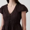 Kort topp med peplum i spetsvoile