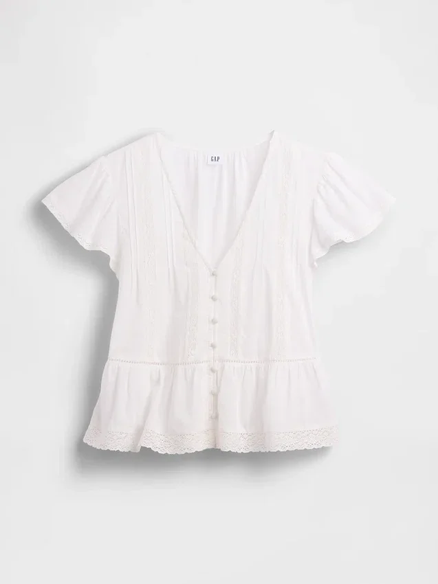 Kort topp med peplum i spetsvoile