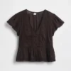 Kort topp med peplum i spetsvoile