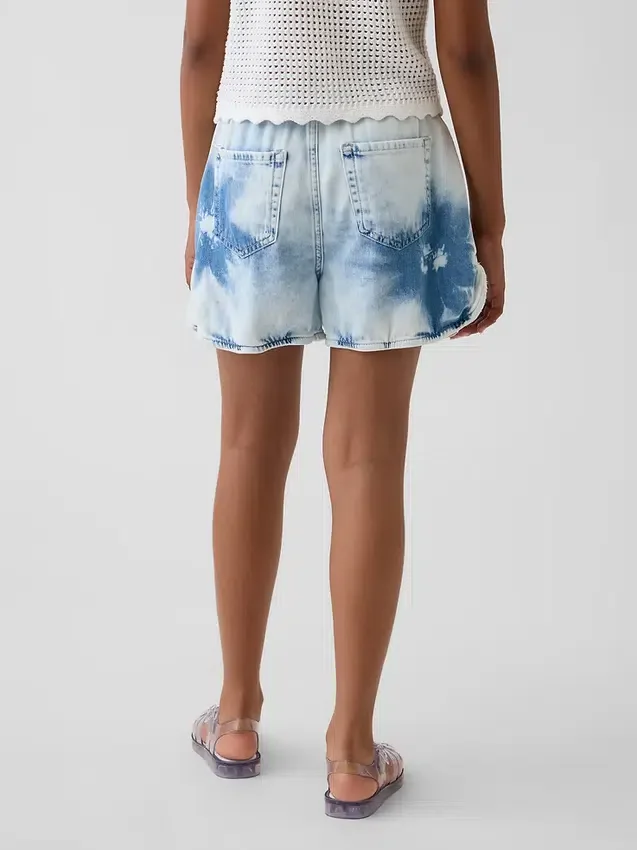 Kortshorts i tie-dye-denim med hög midja för barn