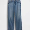 Låg midja, 90-talsinspirerade, lösa jeans med delad fåll