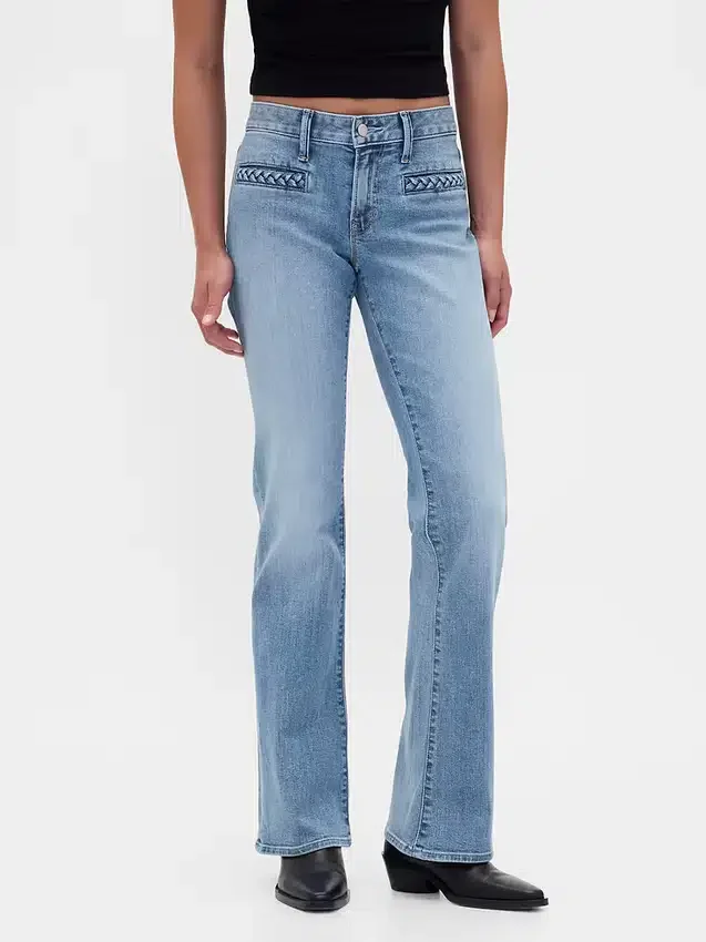 Lågmidjade, flätade fickor, långa och smala Jeans