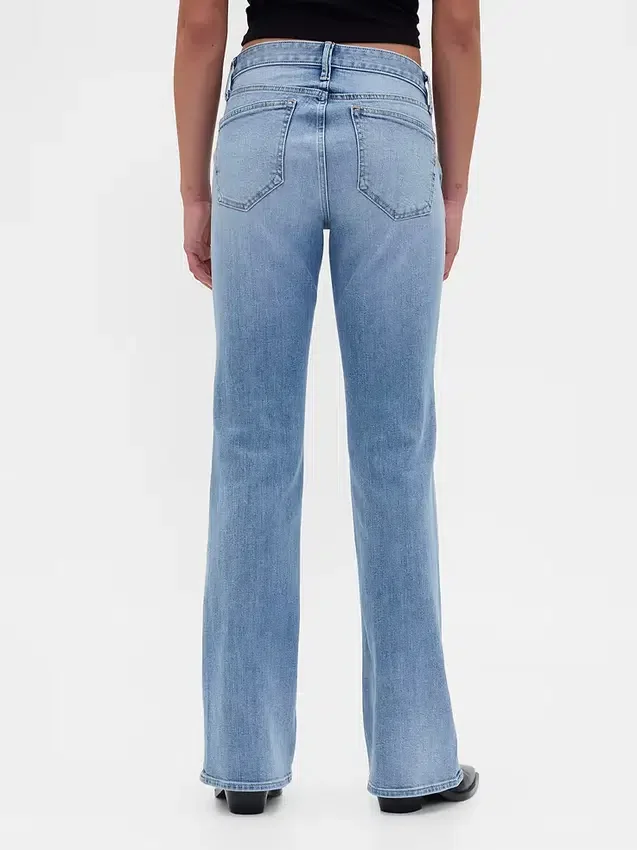 Lågmidjade, flätade fickor, långa och smala Jeans