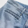 Lågmidjade, flätade fickor, långa och smala Jeans