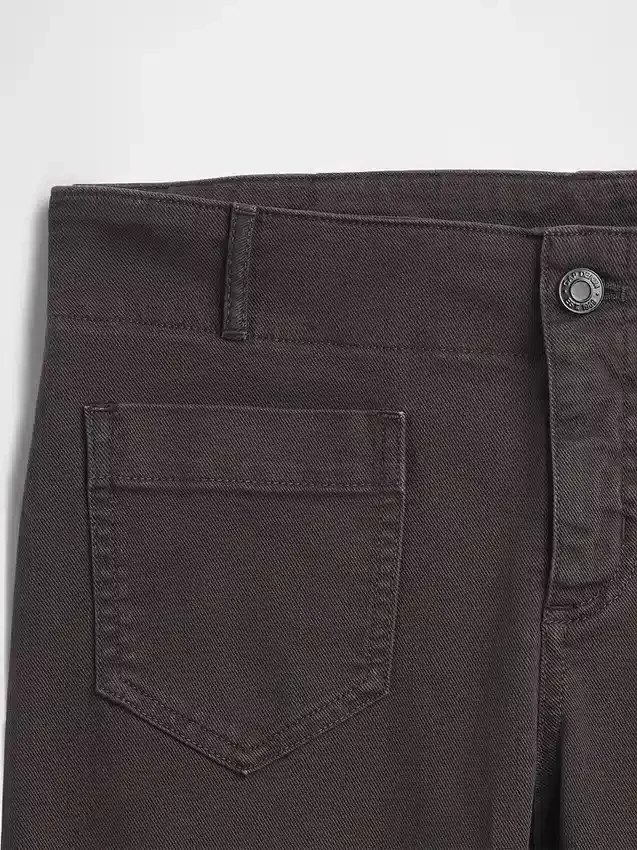 Lågmidjade långa och smala byxor i twill