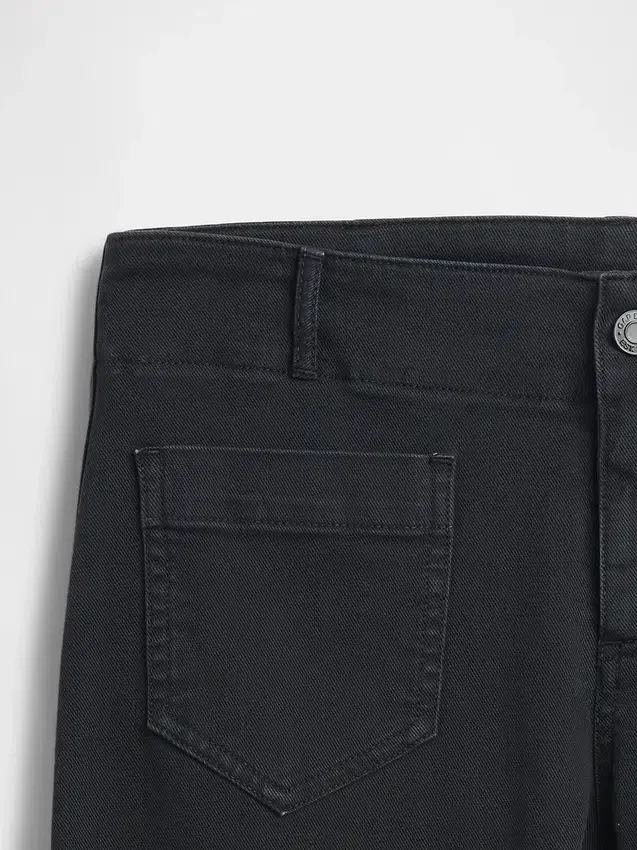 Lågmidjade långa och smala byxor i twill