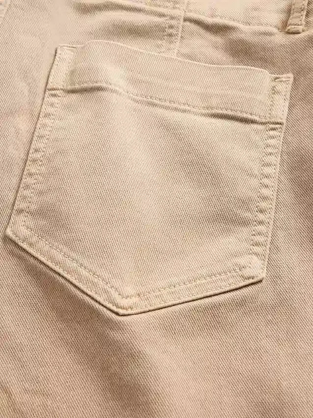 Lågmidjade långa och smala byxor i twill