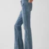 Lågmidjade, långa och smala Jeans med påsydda fickor
