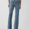 Lågmidjade, långa och smala Jeans med påsydda fickor