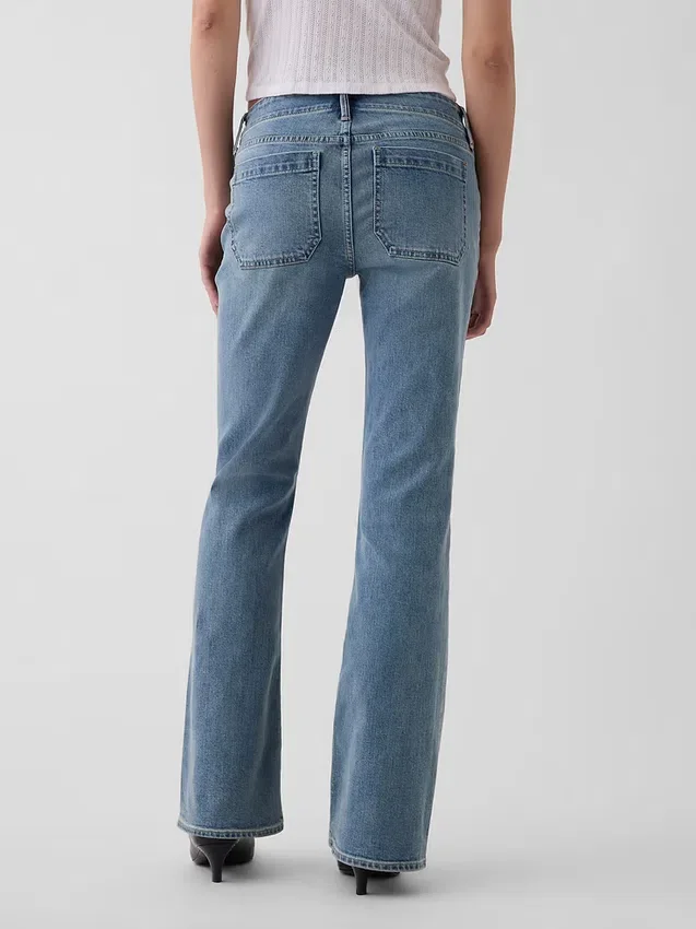 Lågmidjade, långa och smala Jeans med påsydda fickor