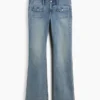 Lågmidjade, långa och smala Jeans med påsydda fickor