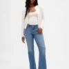 Lågmidjade, långa och smala Jeans med slits i fållen