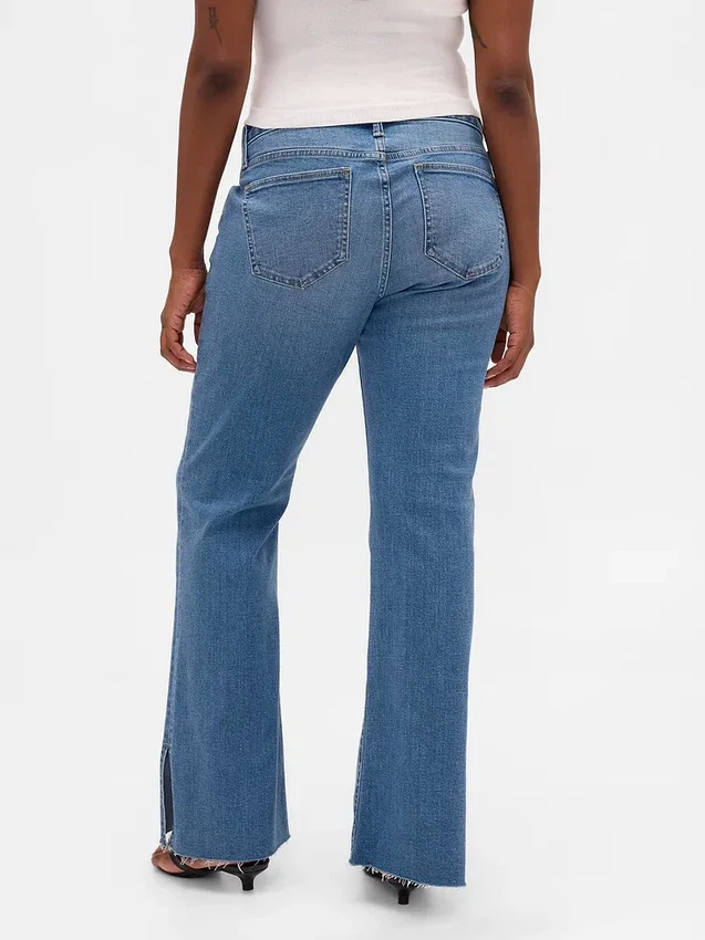 Lågmidjade, långa och smala Jeans med slits i fållen