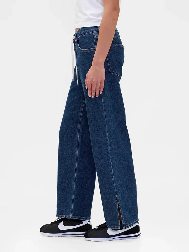 Lågmidjade, lösa 90-talsjeans med dragsko