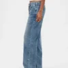 Lågmidjade, snörda, lösa jeans i 90-talsstil