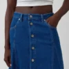 Maxikjol i denim med sömmar och knappar fram