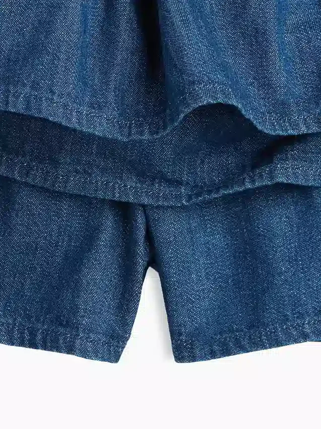 Mini-skort i smockad denim för barn