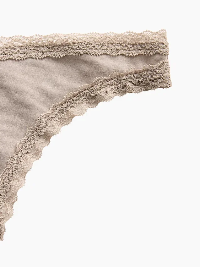 Mjukaste ekologiska stretchbomullstringa med spetskant