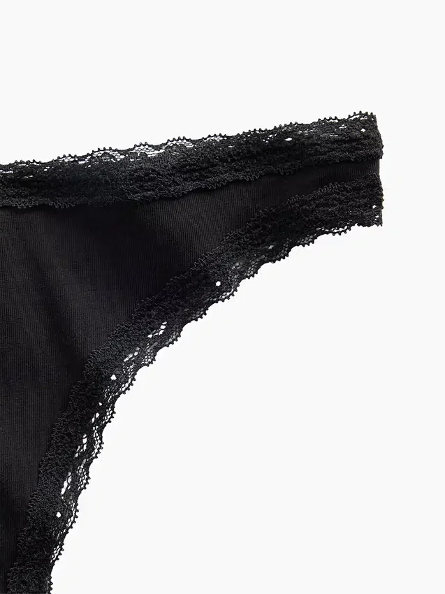 Mjukaste ekologiska stretchbomullstringa med spetskant