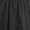 Modern maxiklänning i blandmaterial