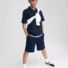 Moderna uniformshorts i khaki för barn