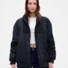 Oversized bomberjacka med stickad kant